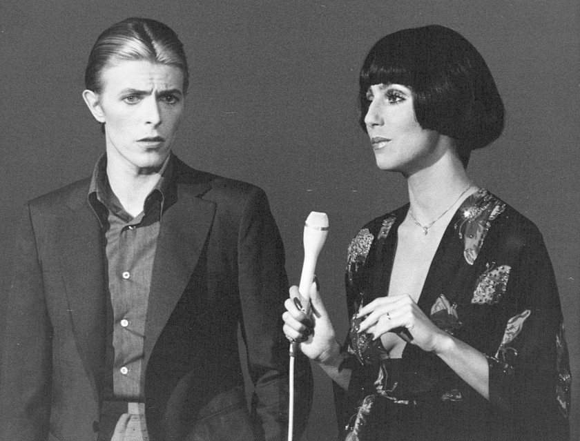 Bowie poses with Cher on the set of her TV show in 1975.